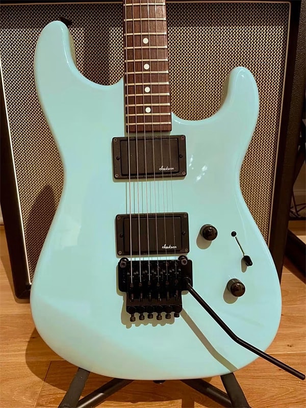 Sonic Blue Charvel (detail) — custom color by Guitar Guru LLC