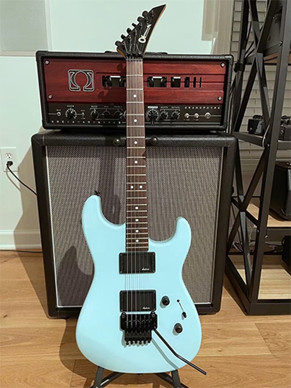 Sonic Blue Charvel with Amp — custom color by Guitar Guru LLC