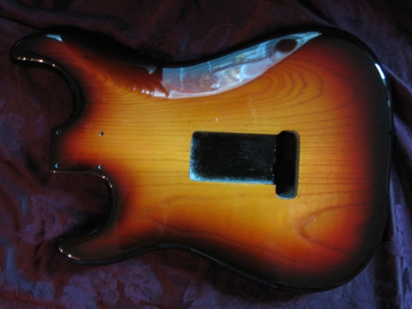 Sunburst Strat (back) — stained guitar by Guitar Guru LLC